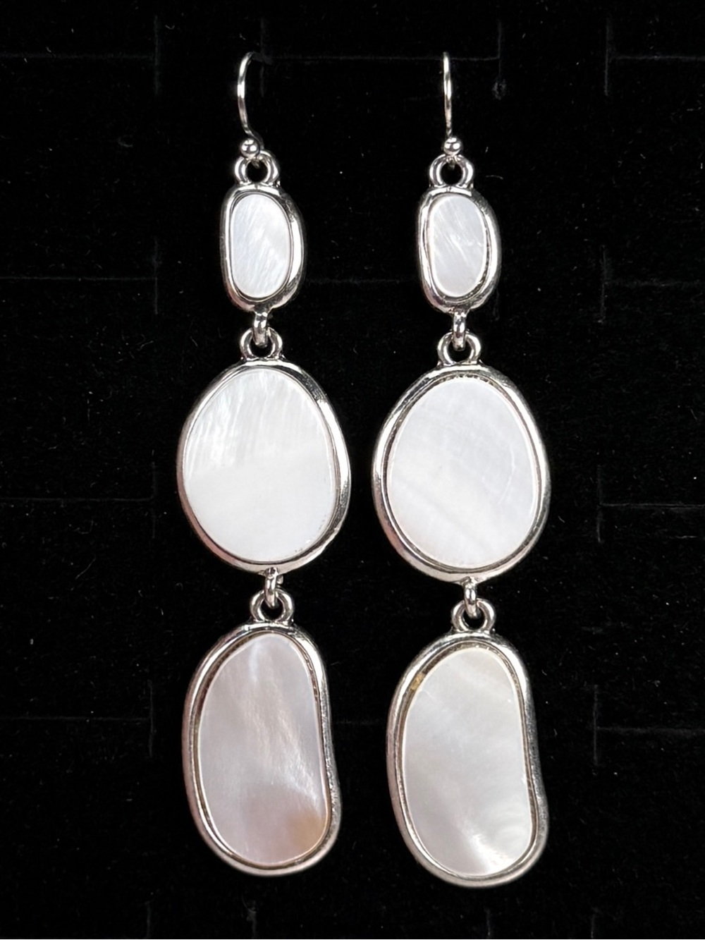Beautiful Silvertone and white accent, long weighted pierced earrings